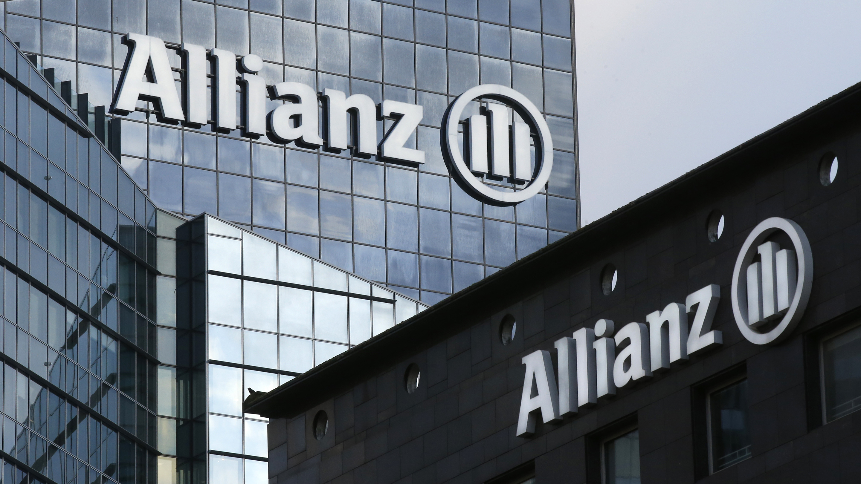 The logo of Europe's biggest insurer Allianz SE is seen on the company tower at La Defense business and financial district in Courbevoie Allianz