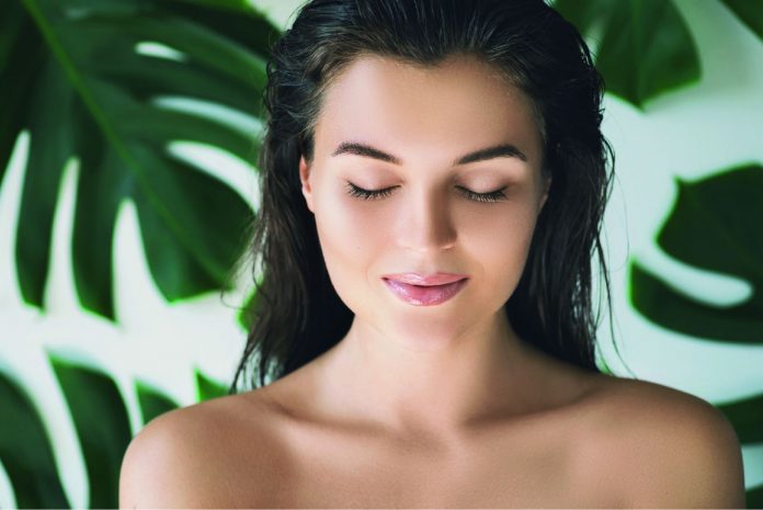 woman_palm_leaves