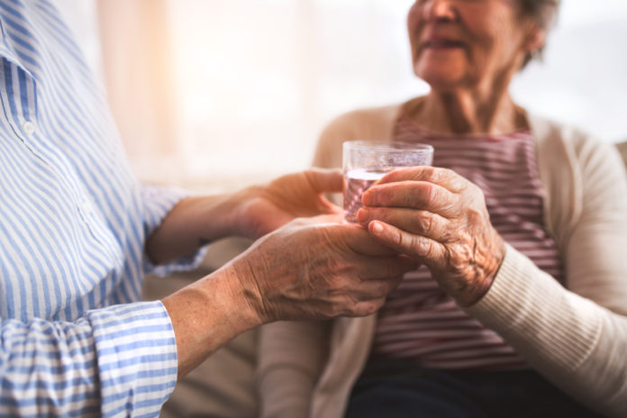 Unrecognizable senior women at home.