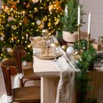 Christmas or New Year festive table setting. Glass of champagne on the table