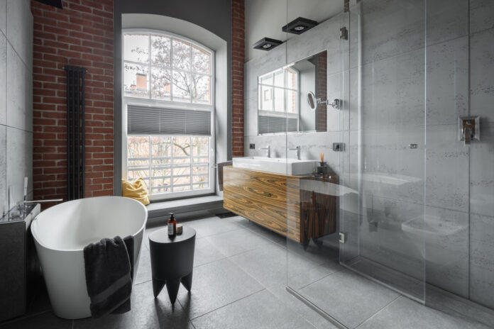 Industrial,Style,Bathroom,With,Oval,Bathtub,And,Walk,In,Shower