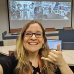 Dr. Michaela Musilova on a call with NASA Houston and an astronaut on the ISS