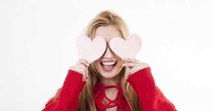 cheerful-woman-having-fun-with-hearts-1-jpg-og-image