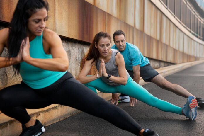 full-shot-people-doing-sport-together-outside